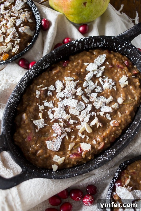 Hearty Cranberry Pear Baked Steel Cut Oats 2 Delicious and hearty cranberry pear baked steel cut oats, perfect for a warming winter breakfast. Topped with toasted nuts and powdered sugar.