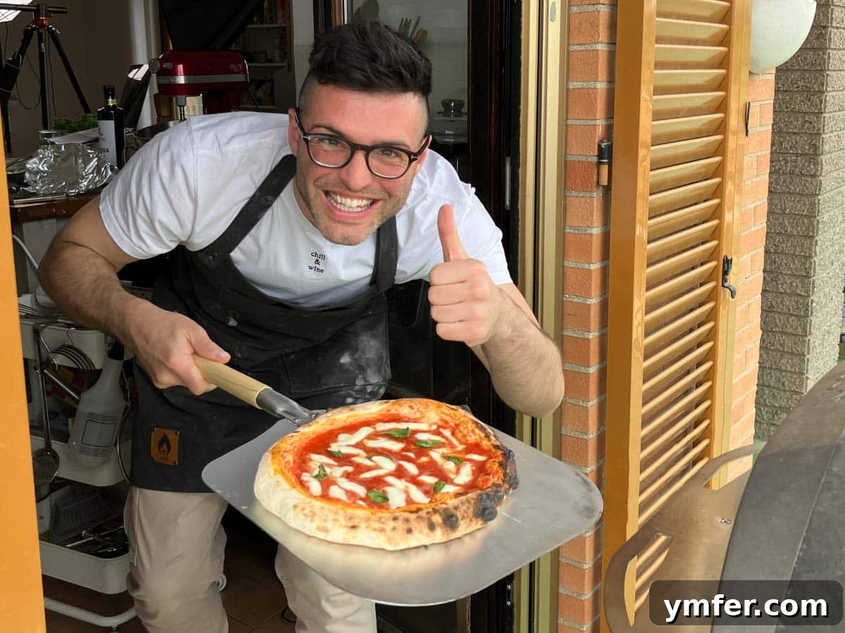 Perfect Ooni Pizza Dough Formula 5 Nico smiling after a successful pizza baking session with the ooni oven