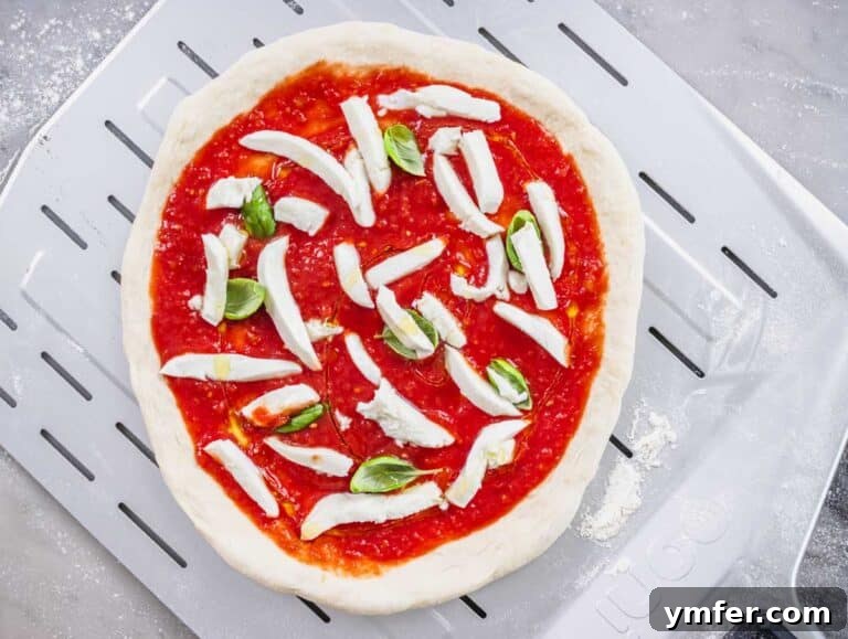 Perfect Ooni Pizza Dough Formula 55 margherita topping on the ooni pizza dough