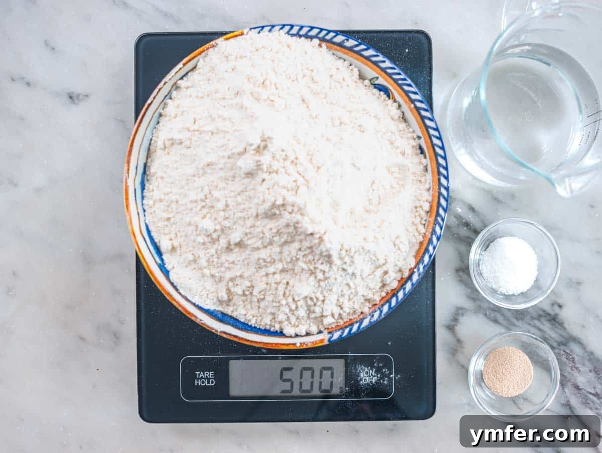 Perfect Ooni Pizza Dough Formula 8 using kitchen scale to weigh the flower and yeast