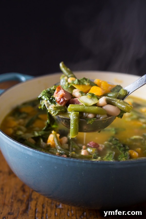 Hearty Butternut Squash Minestrone Soup: A Delicious Winter Comfort Meal Hearty butternut squash minestrone soup, perfect for a cozy winter meal, packed with vegetables and ham.