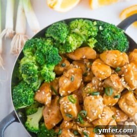 This 20 minute healthier orange chicken is the perfect weeknight dish. Why pay for take out when you can make this quick and easy dish from scratch. Trust me, you'll LOVE this dish it's seriously that EASY!