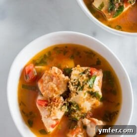 20 Minute Ocean Stew 5 A vibrant bowl of 20 minute seafood stew with cod and shrimp.