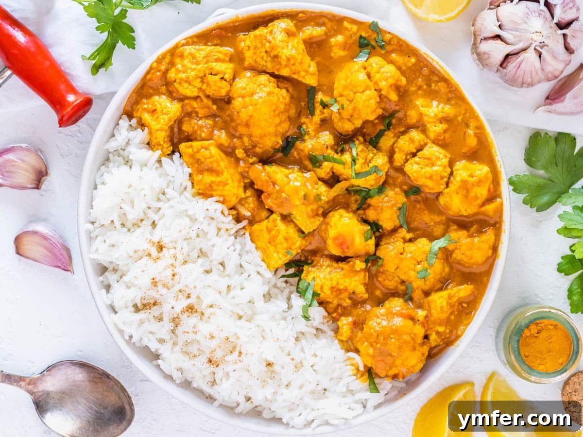 Healthy Asian Kitchen 11 Tofu curry served with basmati rice and lemon wedges