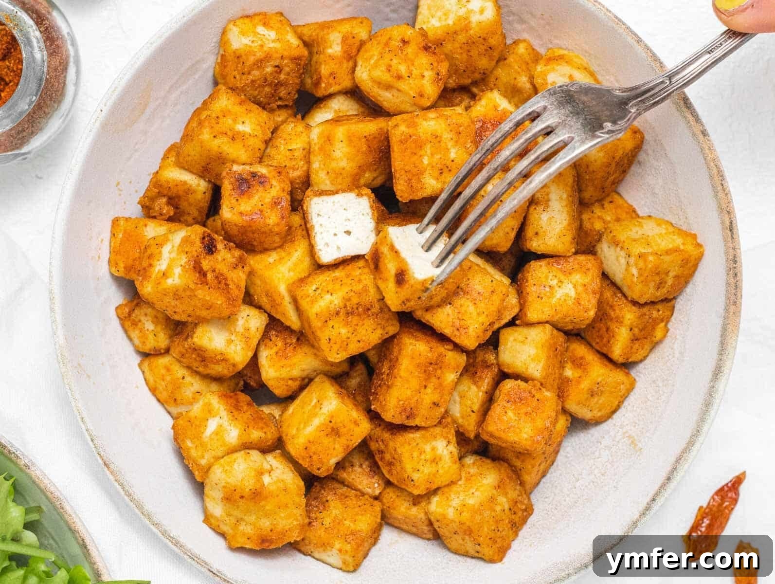 Healthy Asian Kitchen 16 Fried tofu with silver fork