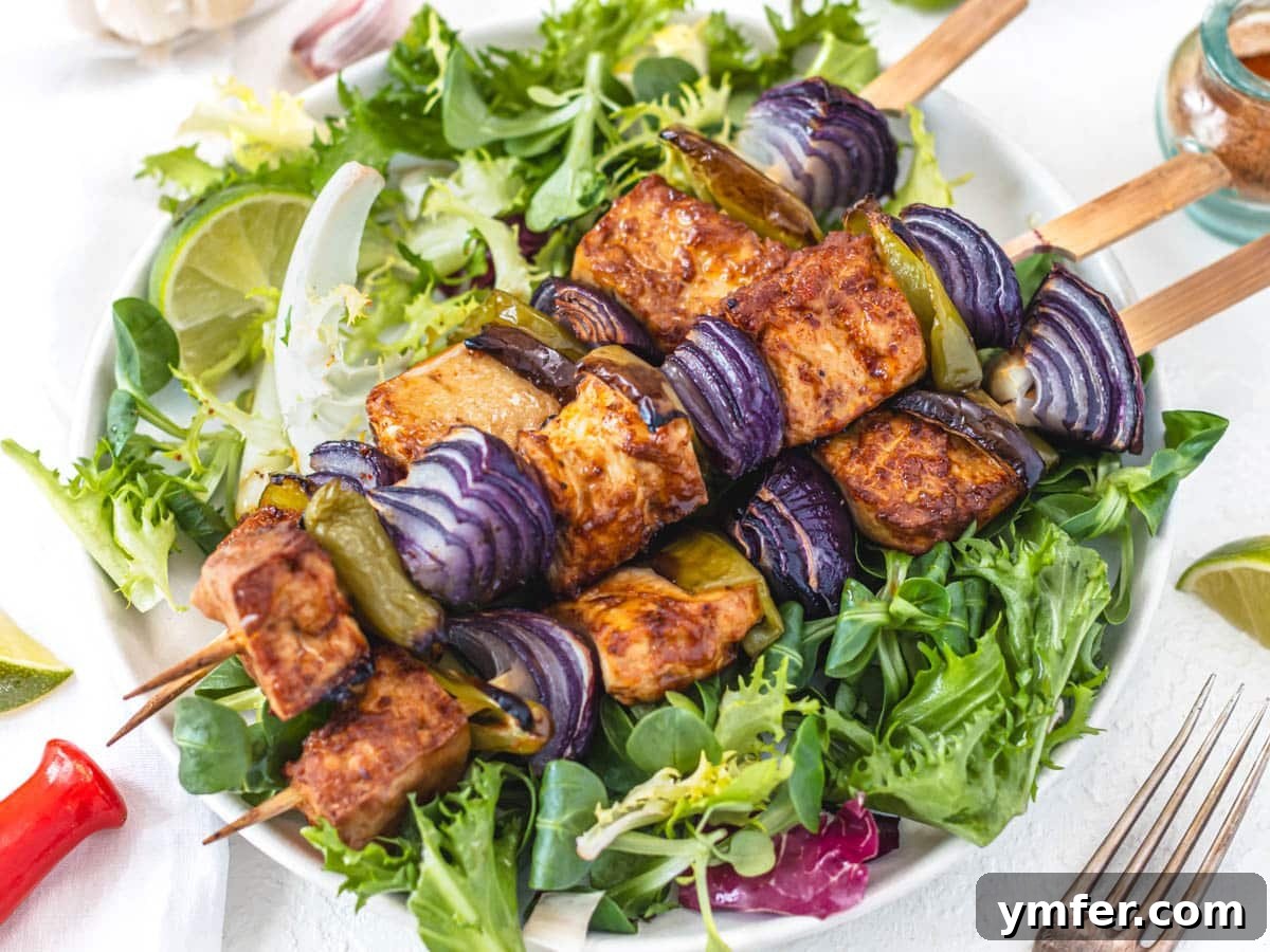 Healthy Asian Kitchen 18 tofu skewers on a bed of salad