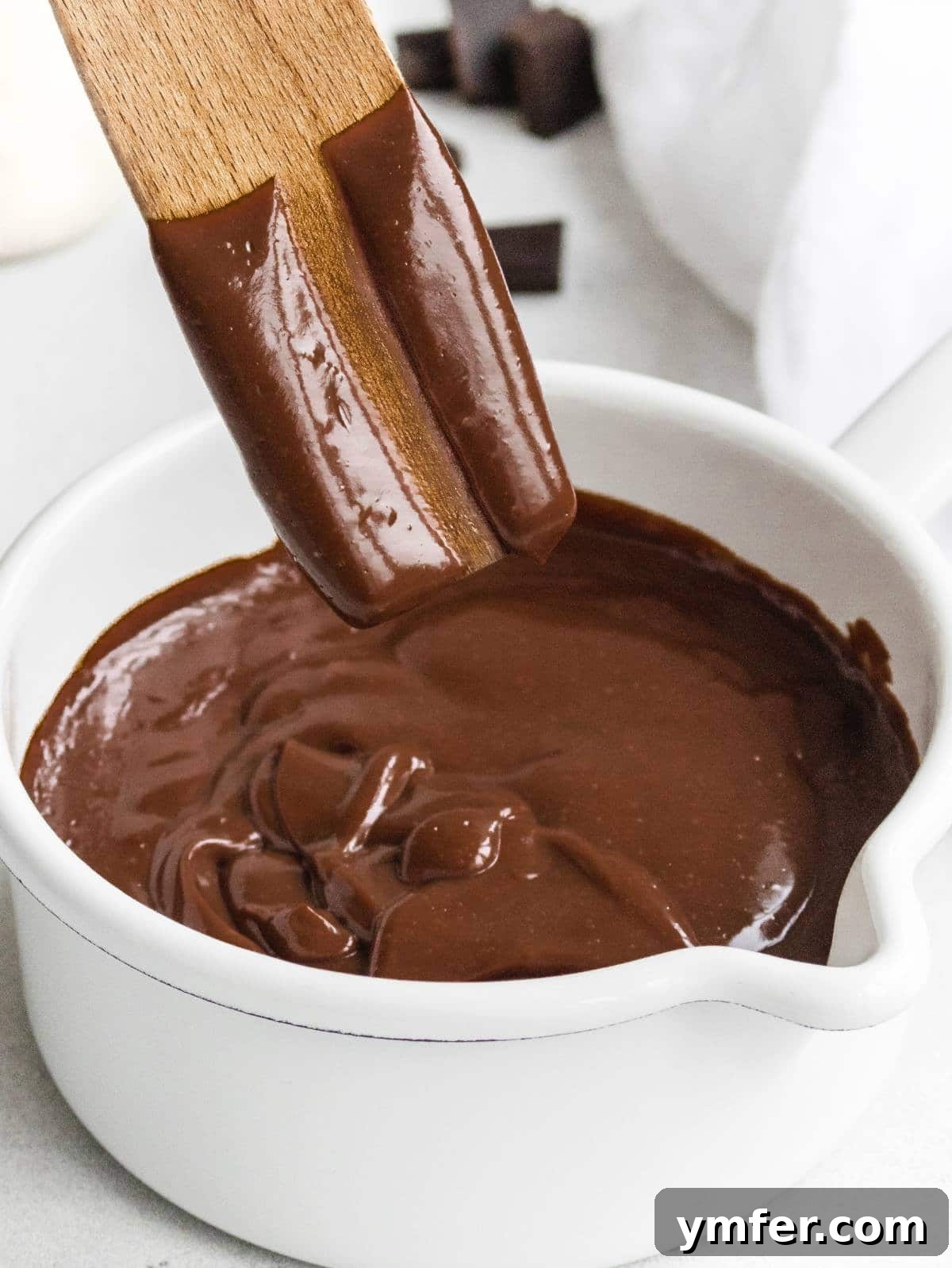 Decadent Chocolate Custard 2 A beautifully set chocolate custard in a pristine white pot, ready to be enjoyed.