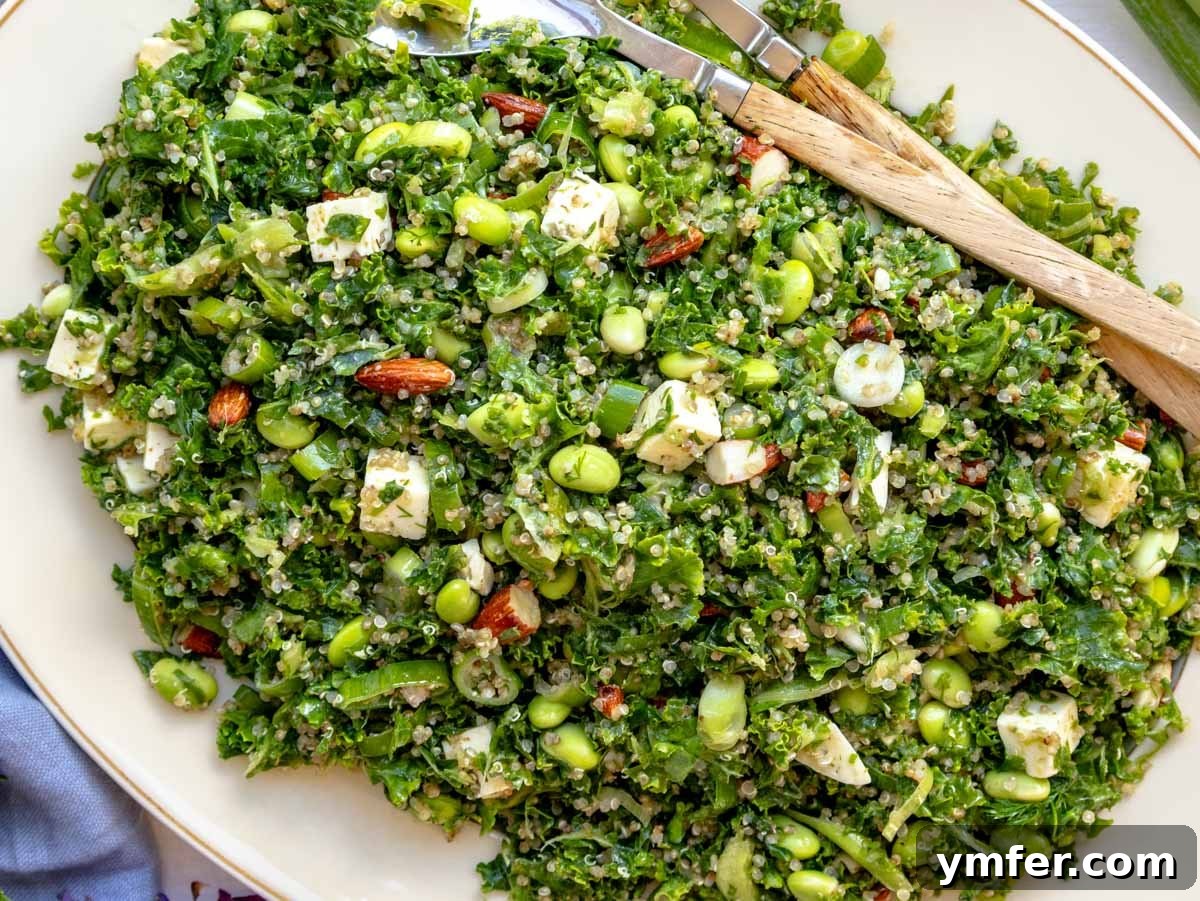 Effortless Quinoa Dishes 4 kale quinoa salad on a white platter with a blue cloth