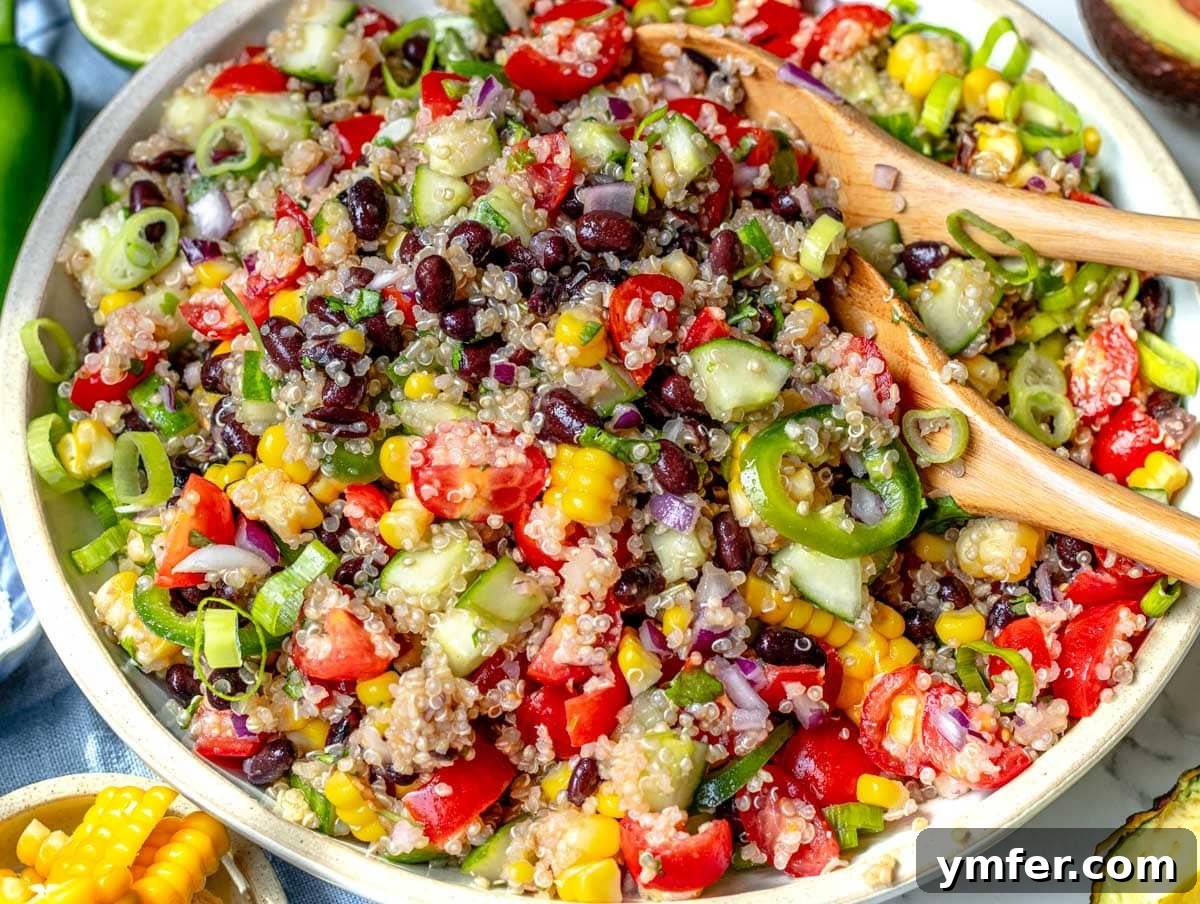 Vibrant Quinoa Bowl 3 quinoa salad with corn and black beans in a bowl ready to be served