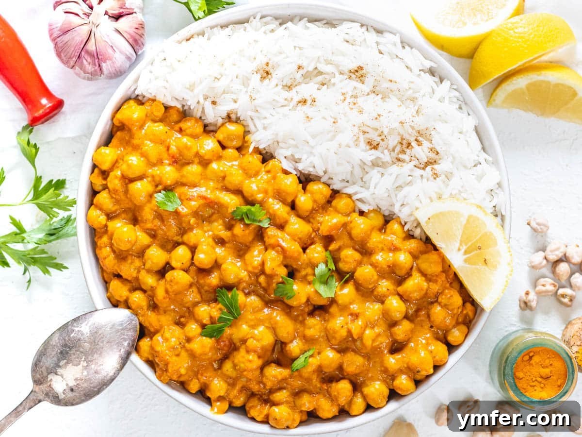 30 Dutch Oven Feasts 22 Chickpea Curry with a silver spoon