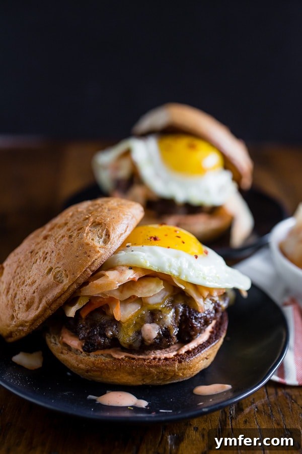 Kimchi Crunch Burger 4 A top-down view of a Kimchi Burger, showcasing the vibrant colors of the kimchi, the perfectly cooked fried egg, and the toasted gluten-free bun, ready to be enjoyed.