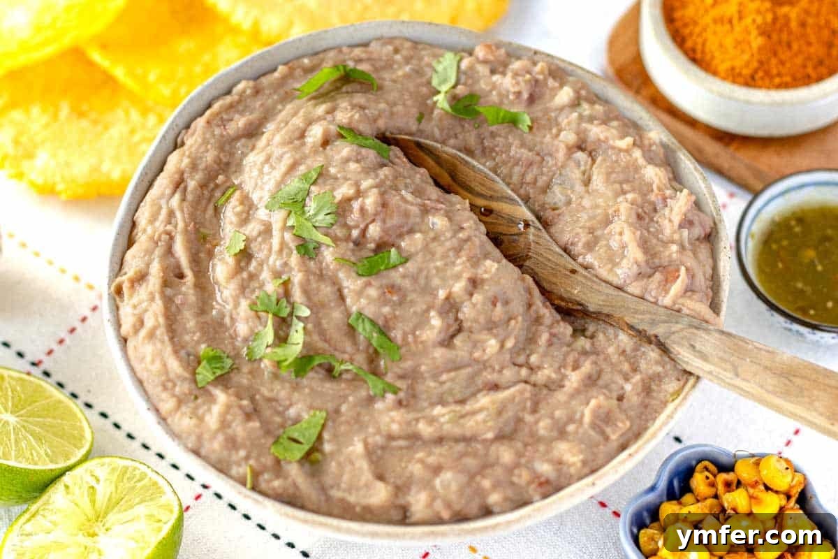 Savory Bean Mash 9 A bowl of freshly made creamy refried beans, ready to be served