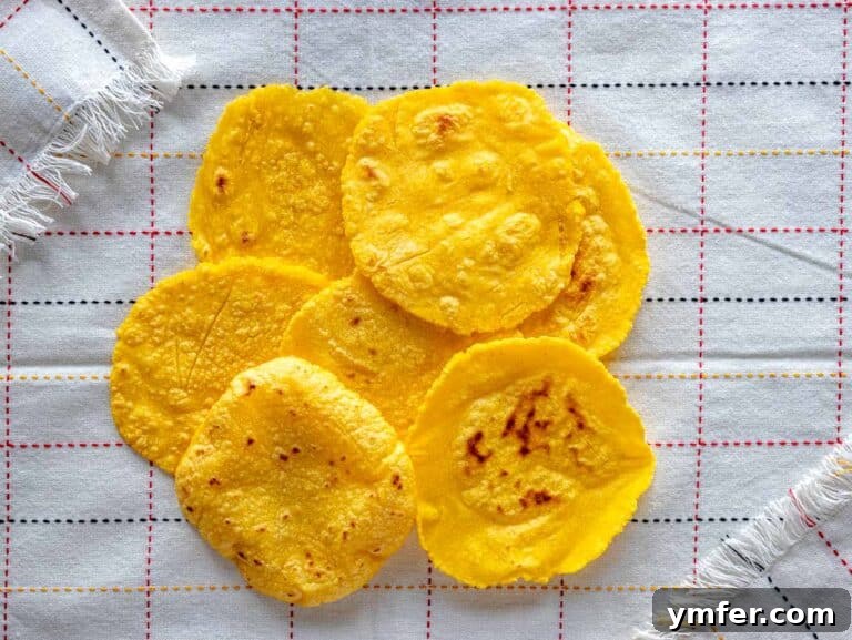 Handcrafted Corn Wraps 15 homemade corn tortillas on a kitchen cloth