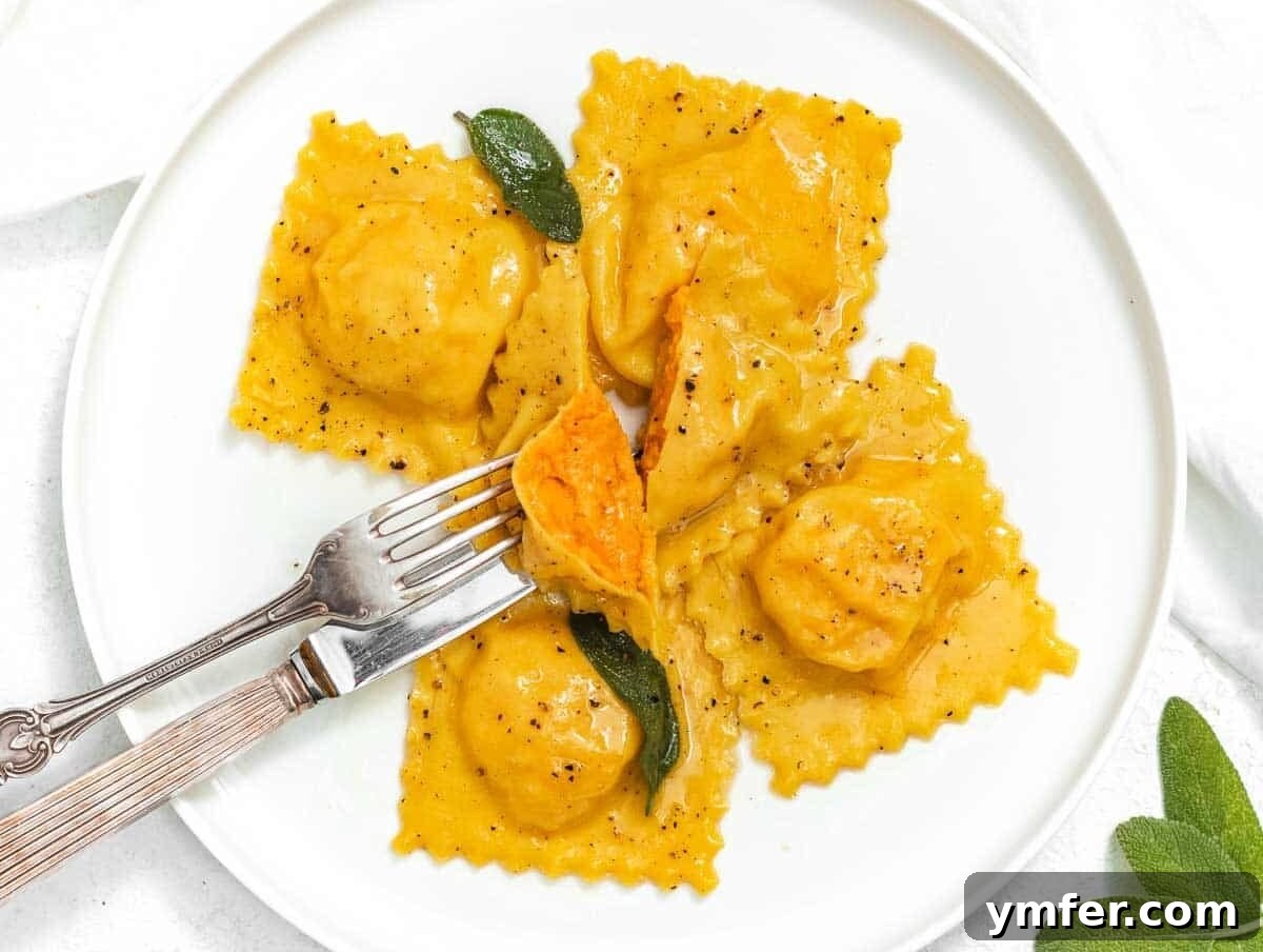 12 Cozy Butternut Squash Dishes 11 Homemade butternut squash ravioli arranged on a plate.