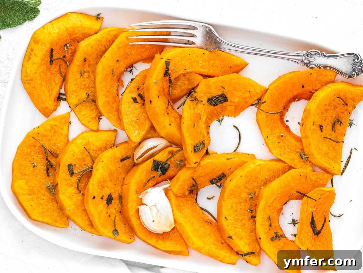 12 Cozy Butternut Squash Dishes 9 Roasted butternut wedges garnished with fresh herbs.