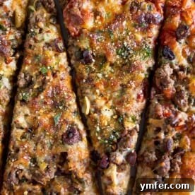 Robust Puttanesca Beef Pizza 5 This beef puttanesca pizza is the perfect gourmet pizza night option. Fully loaded with tons of flavor and ready in just 30 minutes. You’ll love this delicious pasta sauce pizza twist.
