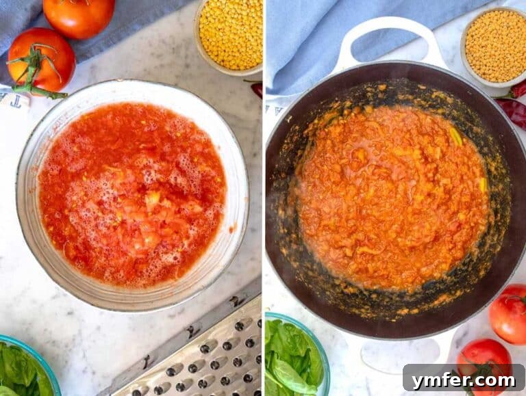 Grated tomatoes combined with the aromatic spice base, cooking in a pot.