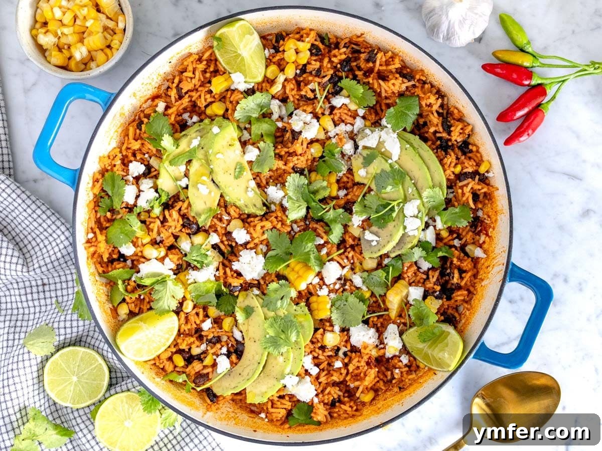 Zesty Fiesta Rice 3 Mexican rice in a blue skillet with corn and avocado, illustrating a complete meal