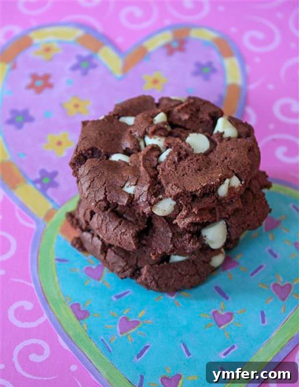 Decadent Double Chocolate White Chip Cookies 2 Fudgy chocolate white chocolate chip cookies on a vibrant background