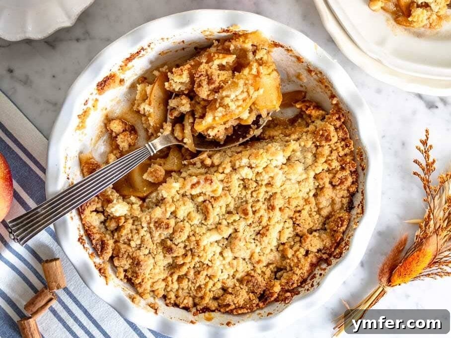 Golden Apple Crumble Perfection 3 Apple crumble in pie dish and a cup of coffee