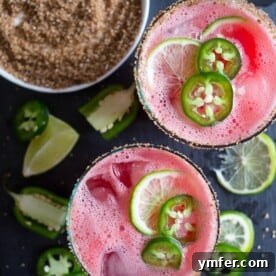 Sweet Heat Watermelon Margarita 6 This jalapeno watermelon margarita is your new favorite margarita. The perfect balance of sweet and spicy and made with fresh pureed watermelon and spiked with jalapenos and just a splash of tequila, lime juice and orange liqueur. This is the spicy cocktail of your dreams.