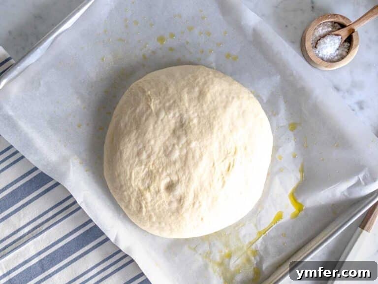 Golden Olive Oil Flatbread 21 Second proofing on a baking tray.