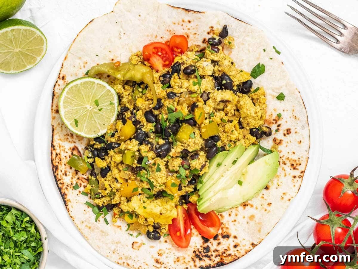 Fuel Your Morning: 30 Plant-Powered Breakfast Creations 16 Vegan breakfast burrito with tomatoes and lime