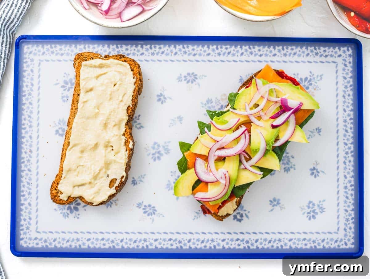 Fuel Your Morning: 30 Plant-Powered Breakfast Creations 3 Hummus sandwich before assembling with red onions and avocado slices