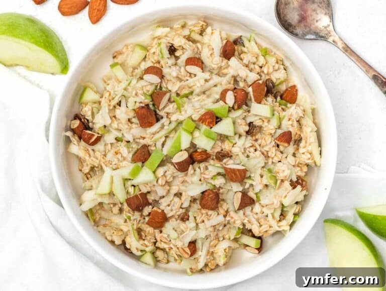 Fuel Your Morning: 30 Plant-Powered Breakfast Creations 37 a bowl of Bircher muesli with grated apple and almonds