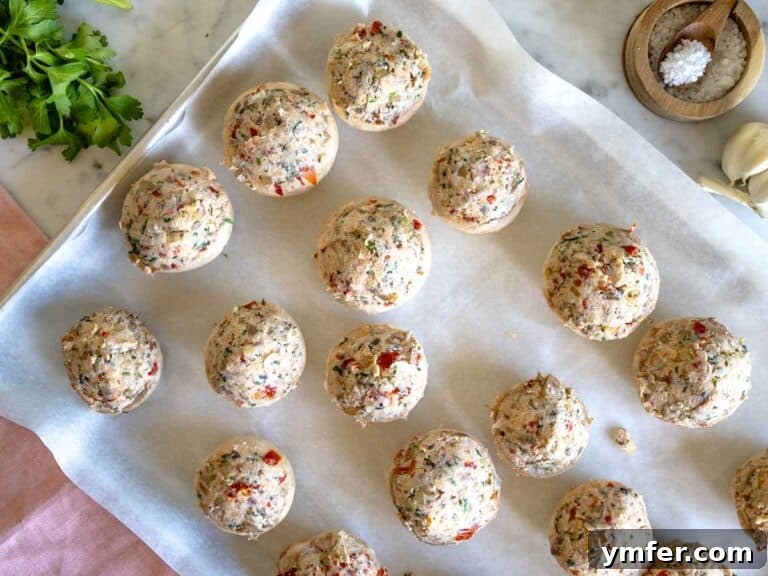 Savory Stuffed Delights 15 before baking the stuffed mushrooms, neatly arranged on a baking sheet
