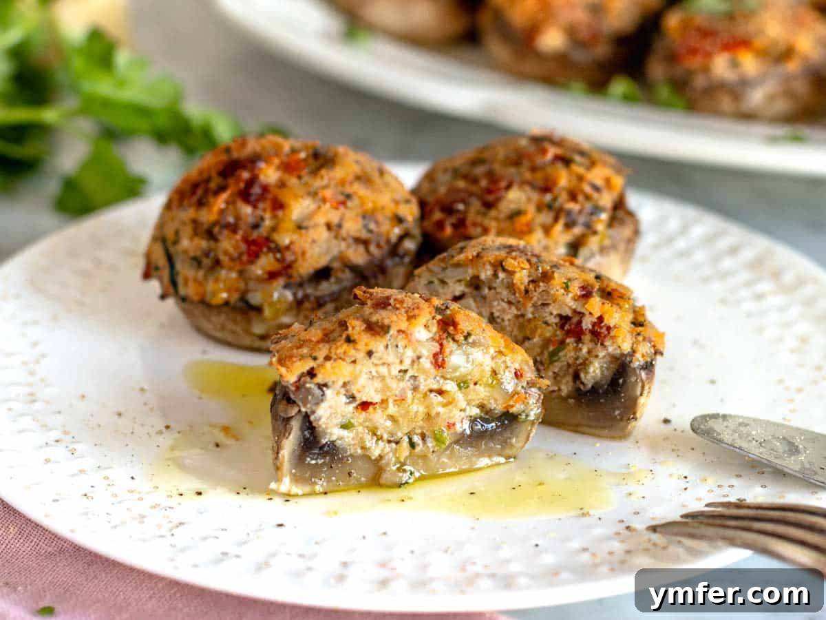 Savory Stuffed Delights 4 stuffed mushrooms cut open on a plate, revealing the intricate texture of the filling