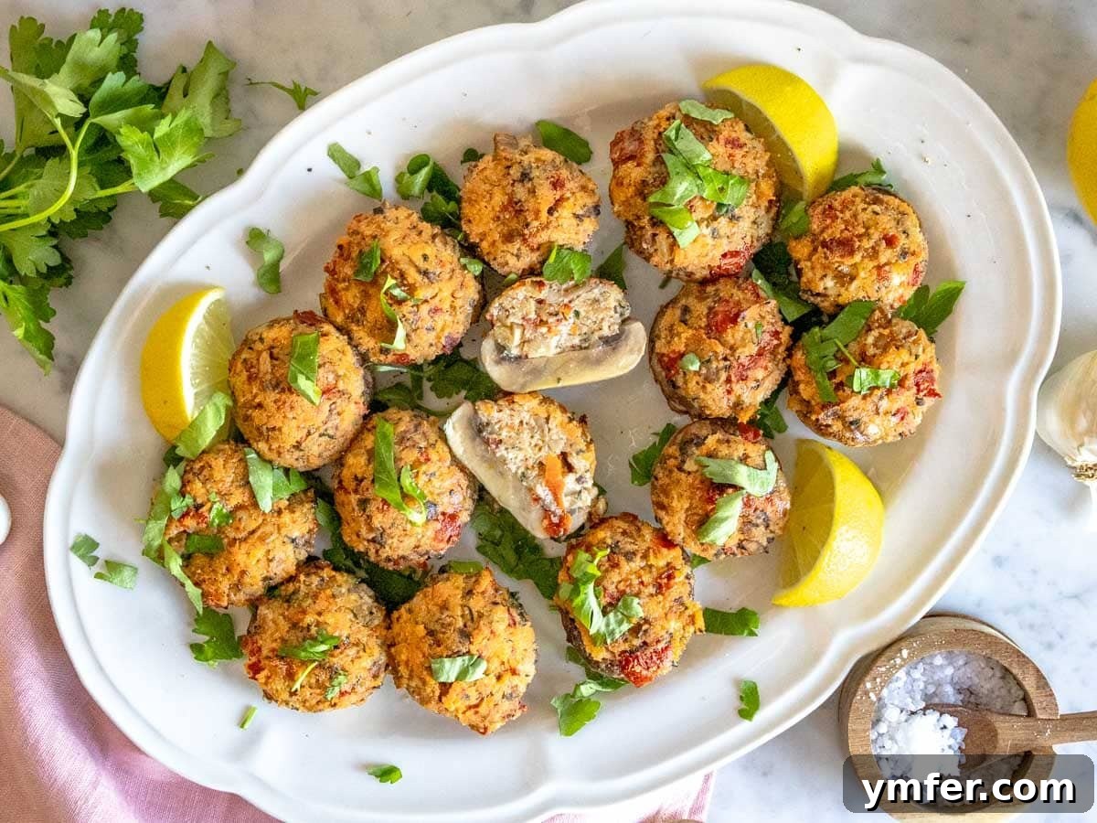 Savory Stuffed Delights 6 A serving platter of golden stuffed mushrooms, garnished with vibrant fresh parsley