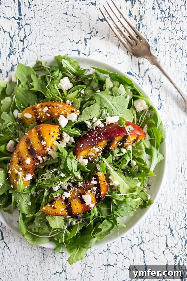 Sweet & Smoky Grilled Nectarine and Feta Salad 2 Grilled Nectarine Salad on a plate.