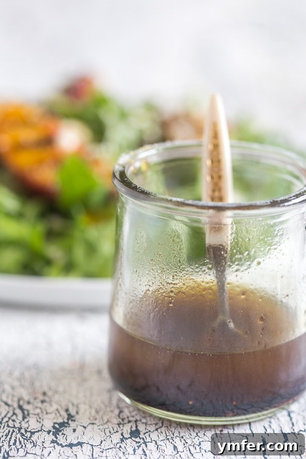 Sweet & Smoky Grilled Nectarine and Feta Salad 4 Honey balsamic dressing in a jar.