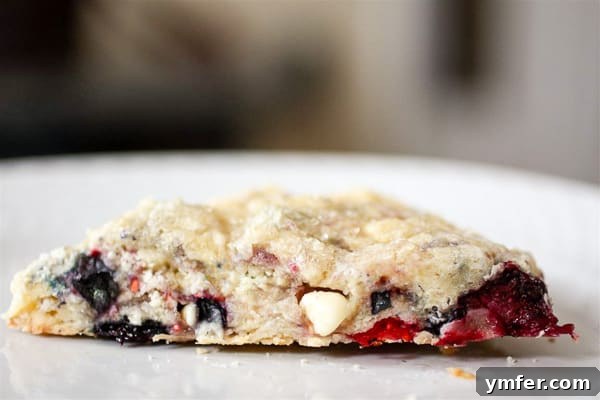 Berry Bliss White Chocolate Scones 3 side view of a mixed berry white chocolate scones