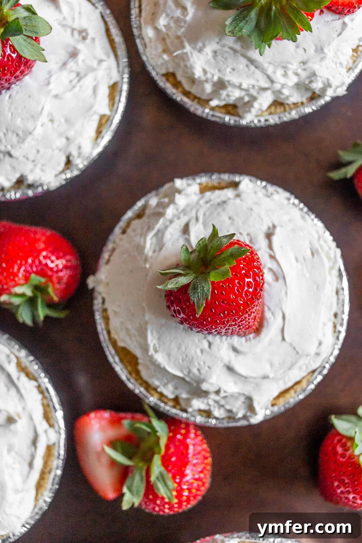 Chilled Strawberry Tartlets 2 No Bake Strawberry Tarts topped with berries.