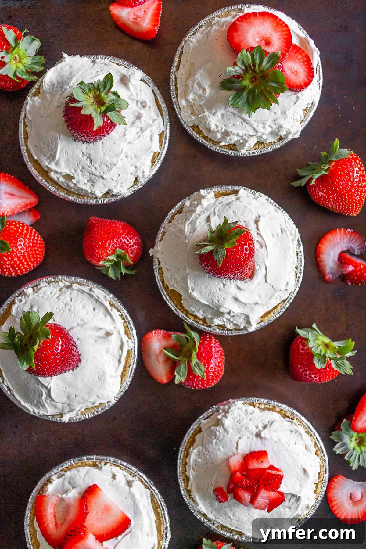 Chilled Strawberry Tartlets 3 Six No Bake Strawberry Tarts sitting on a table.