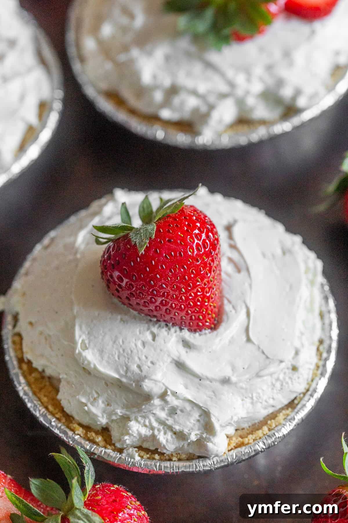 Chilled Strawberry Tartlets 4 No Bake Strawberry Tarts with a full berry on top.