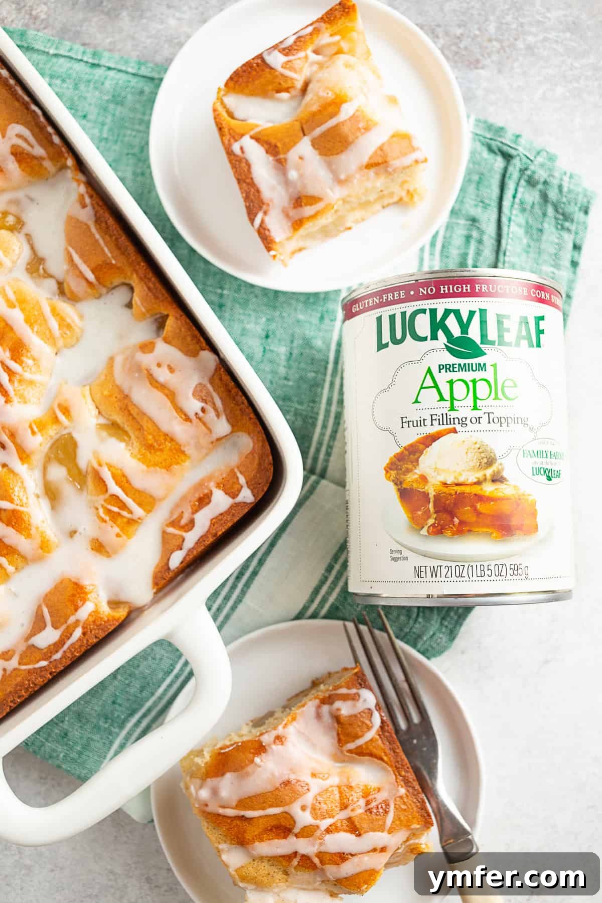 Spiced Apple Streusel Coffee Cake 7 A slice of Apple Pie Filling Coffee Cake presented on a plate next to an open can of Lucky Leaf apple fruit filling, highlighting the main ingredient.