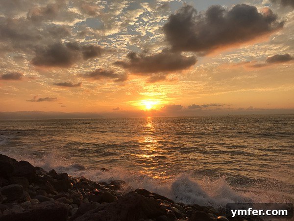 Puerto Vallarta Mexico's Pacific Gem 11 Golden hues of a stunning Puerto Vallarta sunset over calm ocean waters