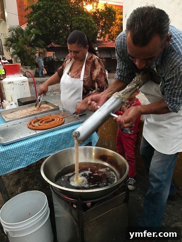Puerto Vallarta Mexico's Pacific Gem 7 Freshly made, hot churros being prepared by a street vendor