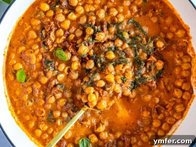 Soulmate Chickpeas 11 Marry me chickpeas presented beautifully in a white skillet, garnished and ready.
