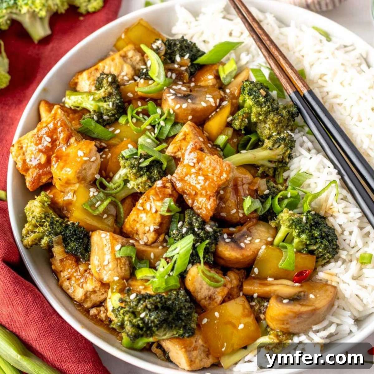25 High Fiber Power Foods 27 Tofu stir fry in a bowl with rice.