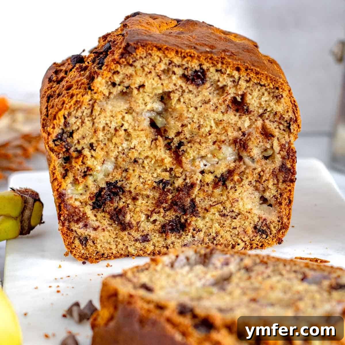Healthy banana bread studded with delicious chocolate chips, presented as a comforting breakfast option.