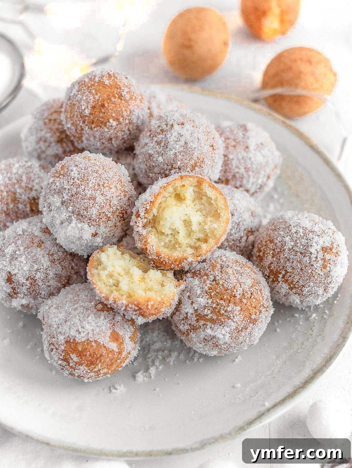 Castagnole Italian Carnival Fritters 3 Close-up of golden, deep-fried Italian donut holes, known as Castagnole, a popular Carnival sweet