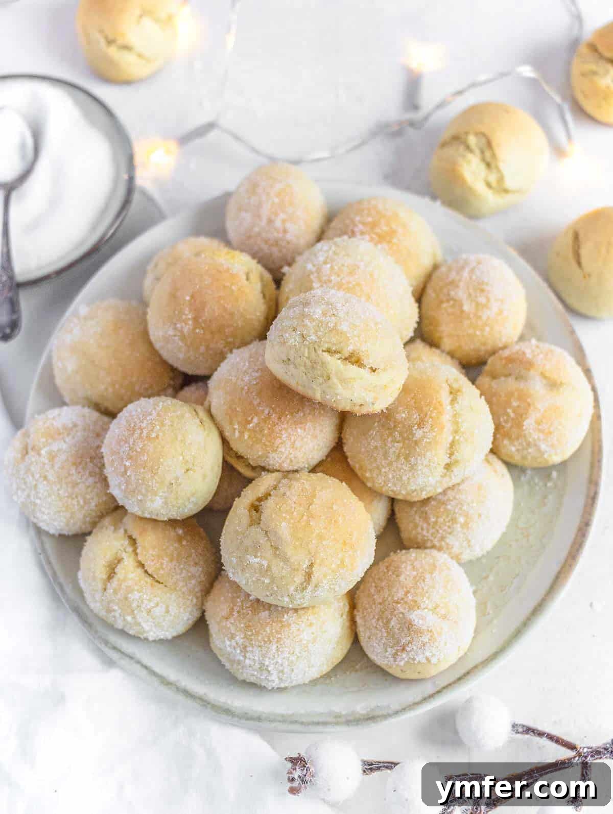 Castagnole Italian Carnival Fritters 22 Simple oven-baked Castagnole, dusted lightly with sugar, showcasing their rustic charm