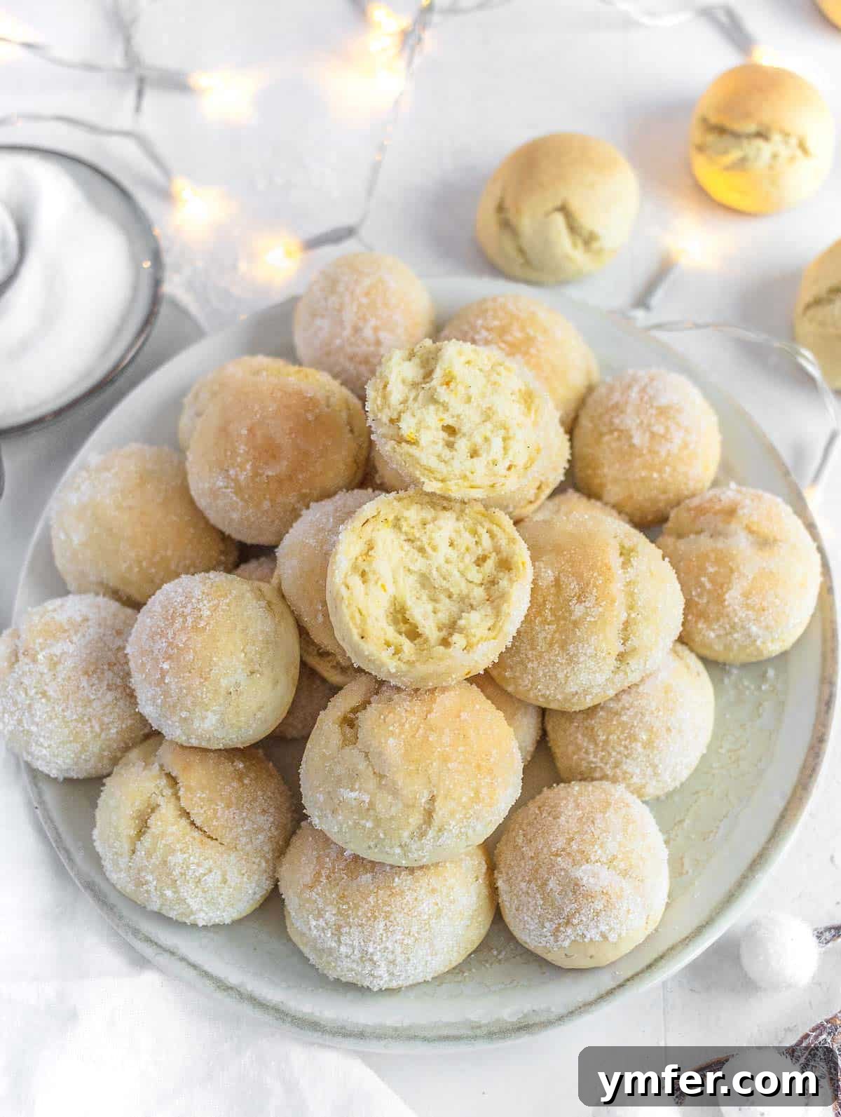 Castagnole Italian Carnival Fritters 4 Oven-baked Castagnole, showcasing their soft, moist, and light texture, ideal for a healthier Italian sweet