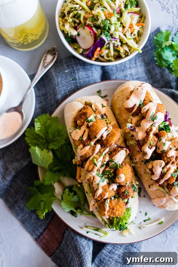 Fusion Shrimp Po Boy 2 This Asian shrimp po boy sandwich is packed full of flavor and perfect for the busy weeknight meal planning. First, you take a crusty roll and pack it full of a crunchy Asian flavored broccoli slaw, top with crispy baked shrimp and drizzle with spicy Sriracha mayo. You'll love this sandwich!