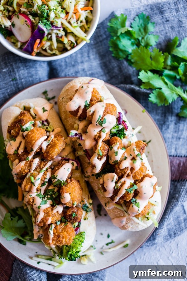 Fusion Shrimp Po Boy 4 Asian Shrimp Po Boy Sandwich drizzled with spicy mayonnaise.