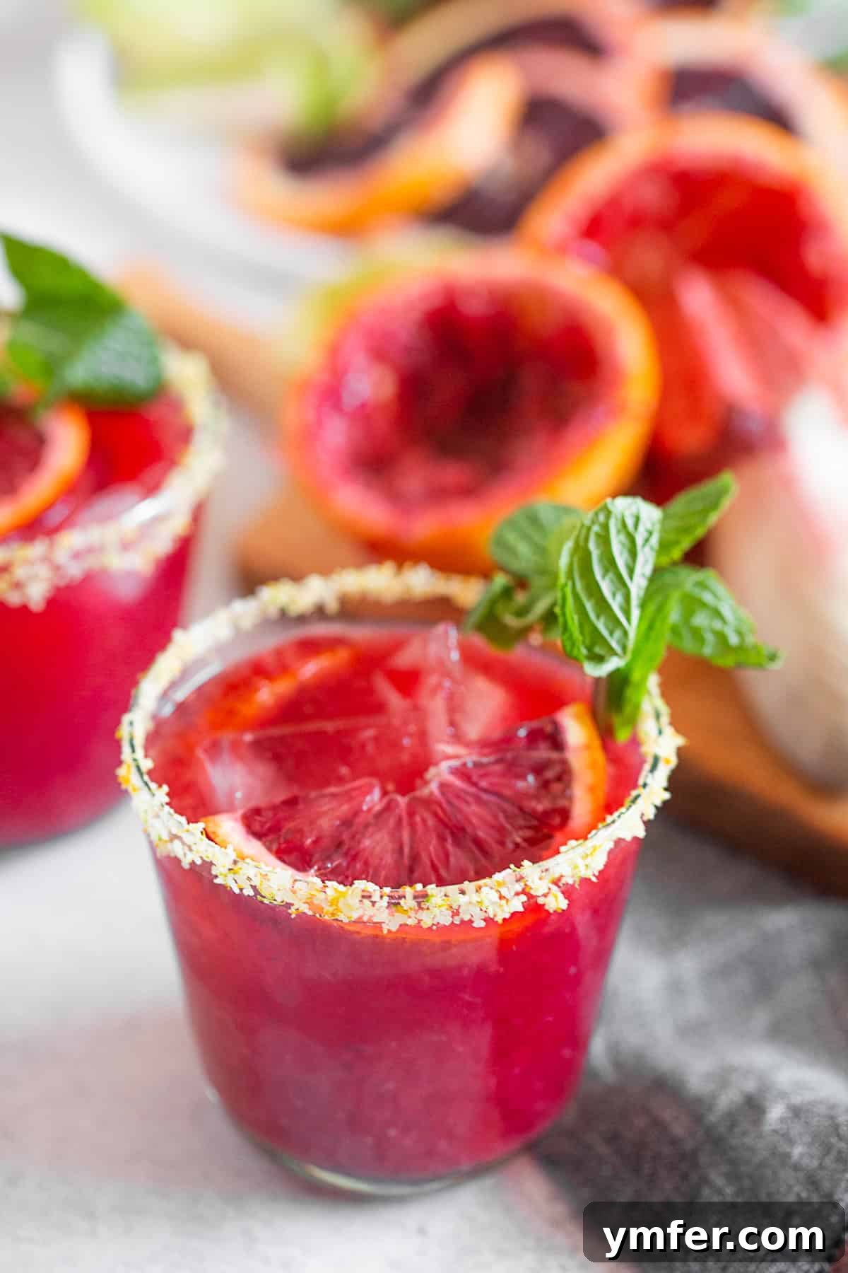 Ruby Red Margarita 4 Blood Orange Margarita with a salt citrus rim, ready to drink.